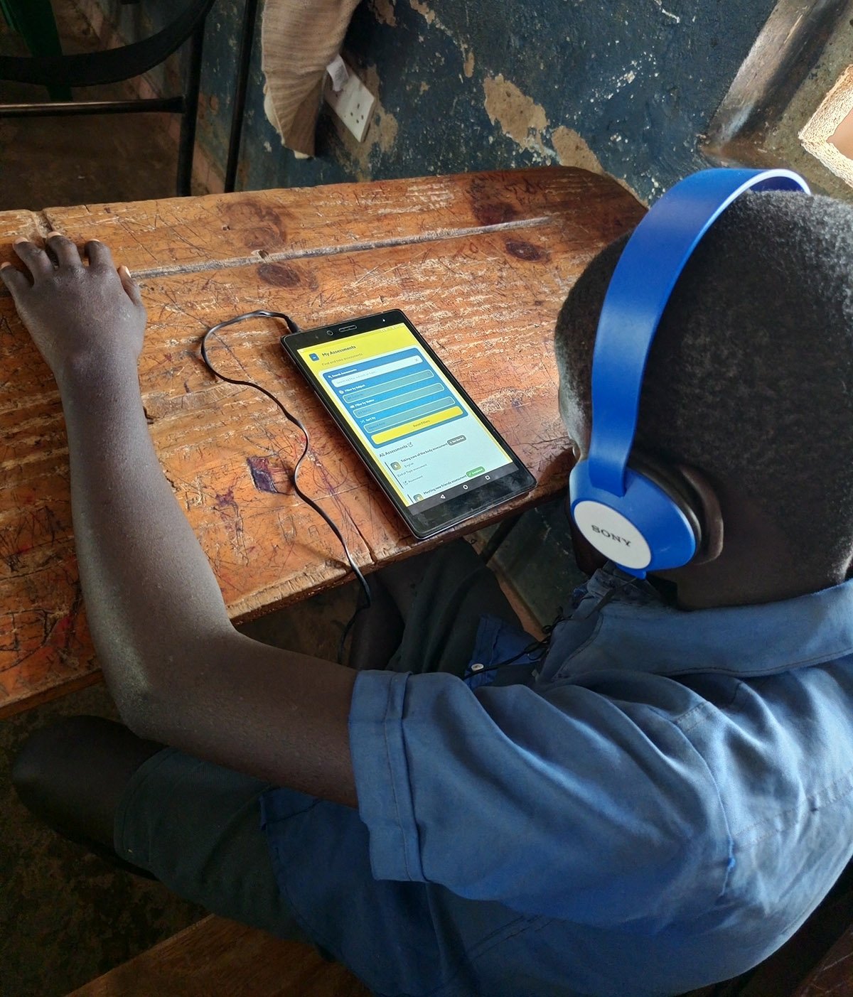 P. Kay working in an education technology setting